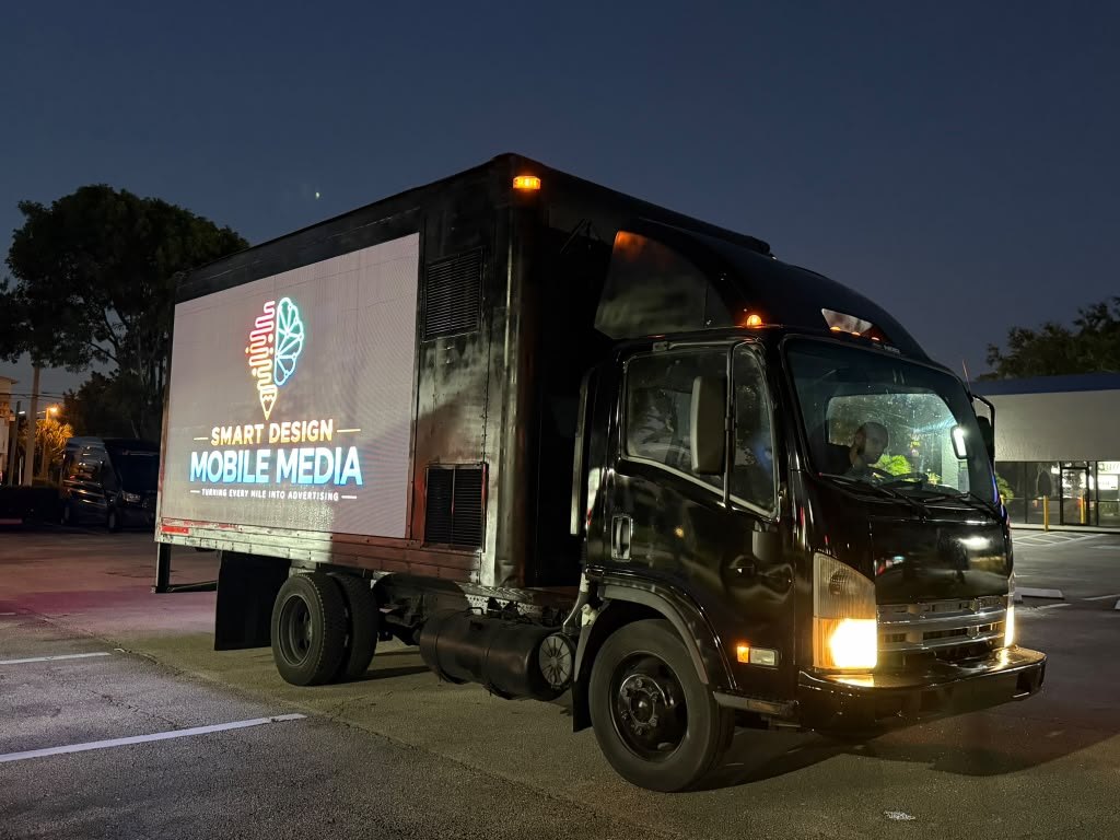 LED billboard truck front angle at night